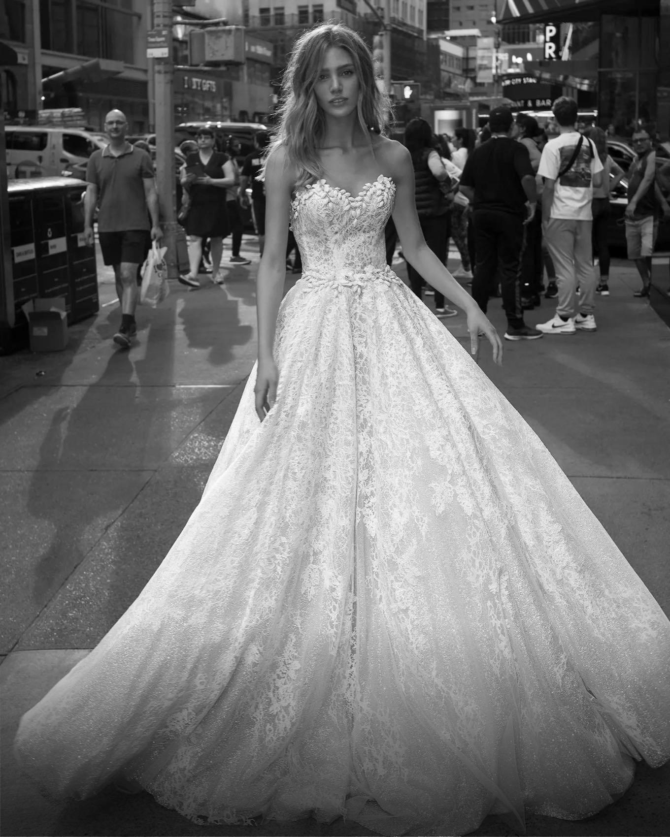 Model wearing a white gown by Ballgown. Orlando bridal shop