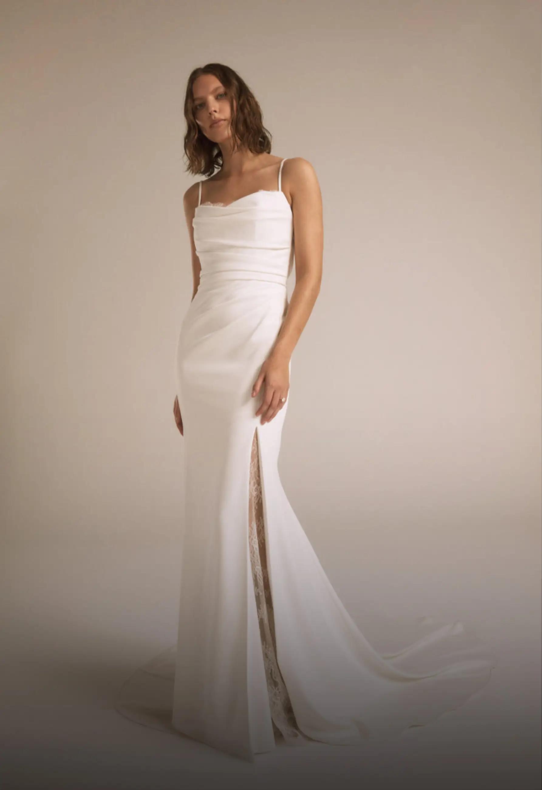 Model wearing a white gown by Fit & Flare, Orlando bridal shop