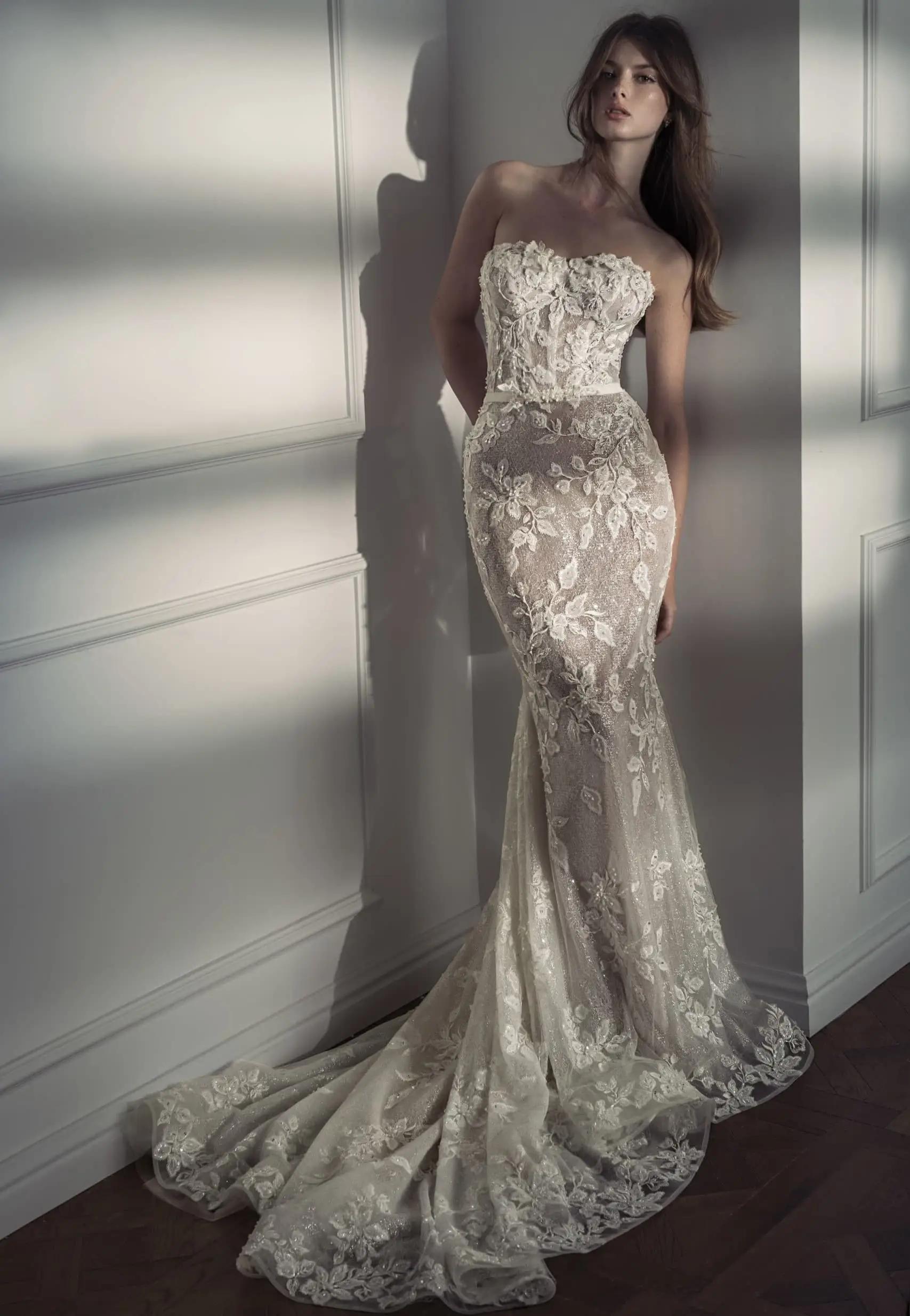 Model wearing a white gown by dany tabet