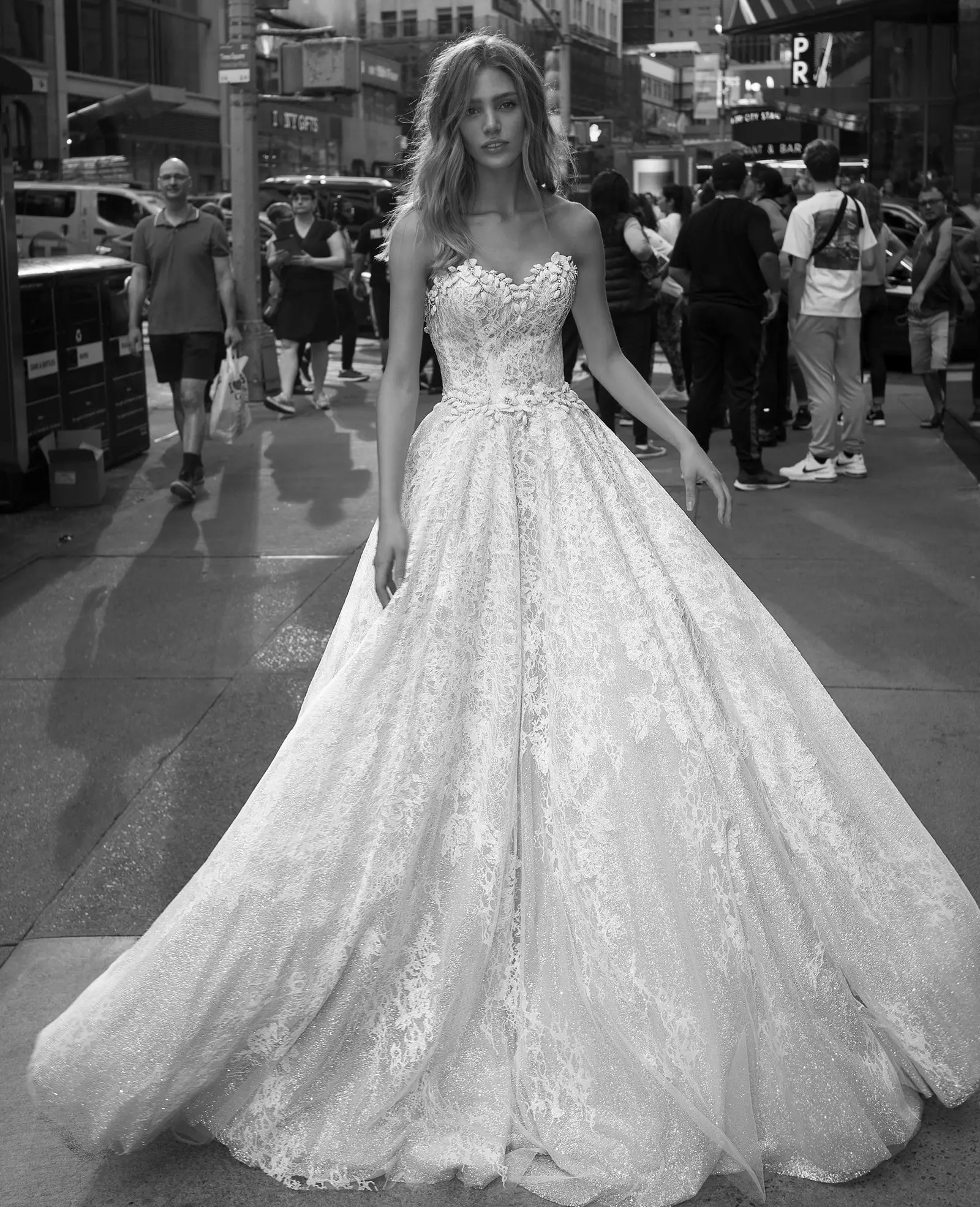 Model wearing a white ballgown