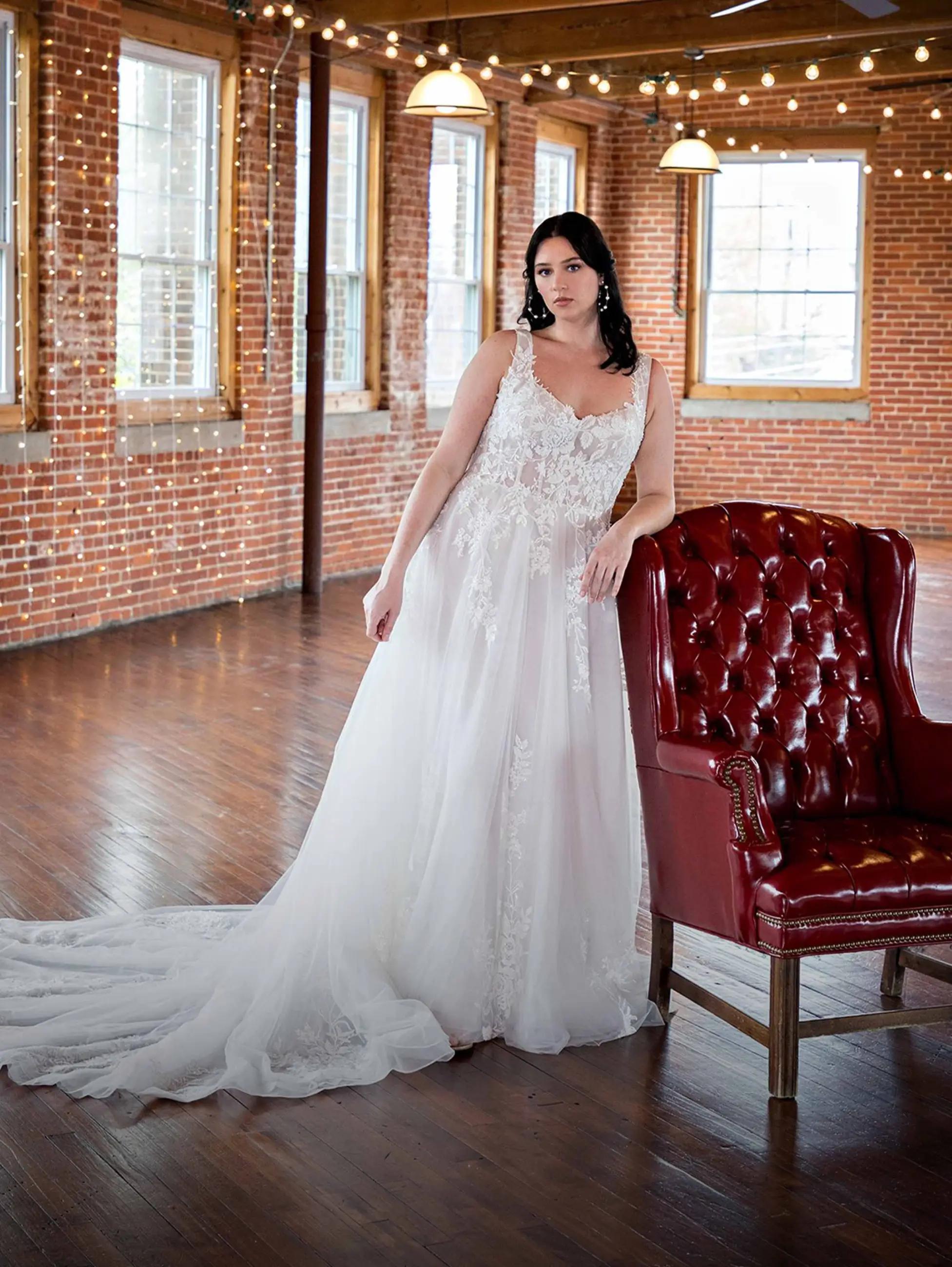 Orlando bridal shop, Model wearing a white gown by Plus Size