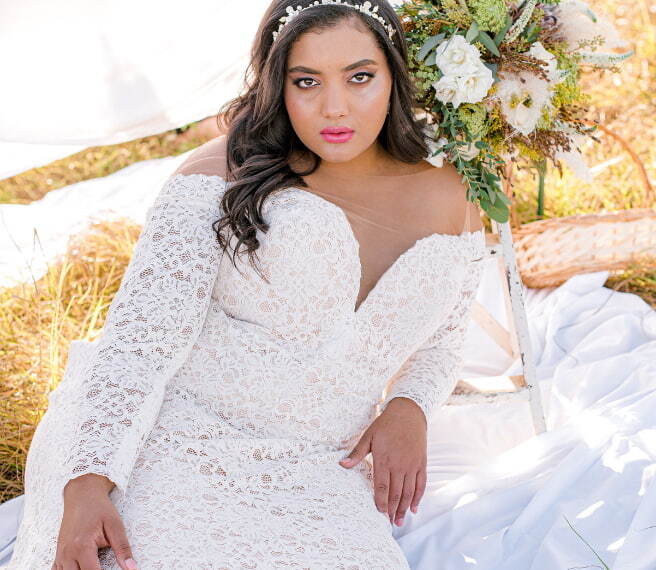 Model wearing a white gown