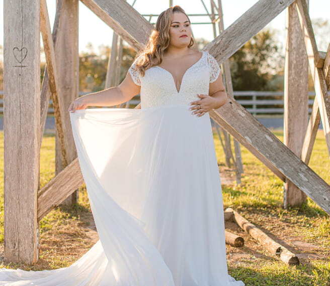 Model wearing a white gown